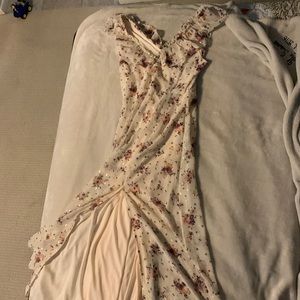 Beautiful floor length dress with a split.